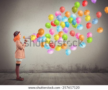 Clown funny and creative screams colorful balloons