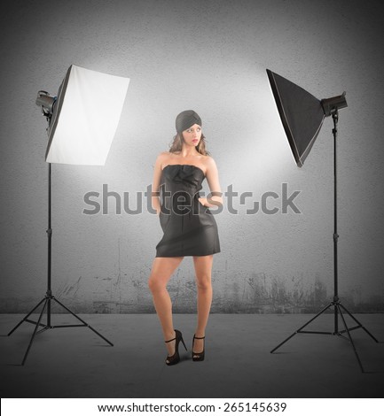 Girl model posing in a photo studio