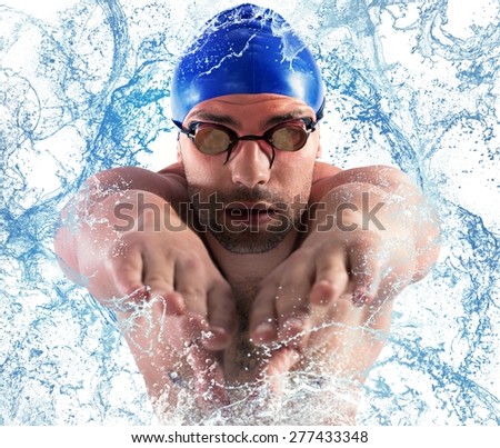 Professional swimmer enters the water with splash