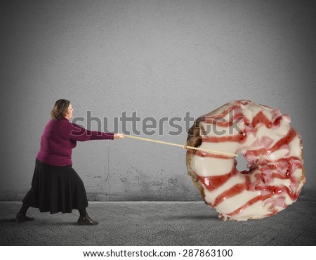 Fat woman with rope pulling a donut