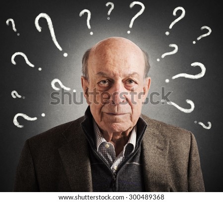 Old man confused with many question marks