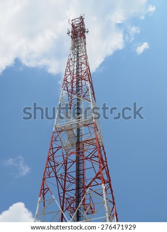 Four legged angular communication tower soaring into sky