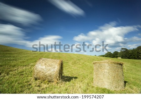Bales of Hay in north Poland field.Pomerania province.Long time exposure/Bales of Hay