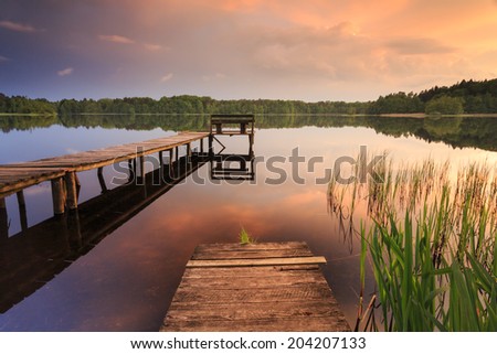 Colorfull sunset on Bobiencino  lake in north Poland. Pomerania province. / Silent Place