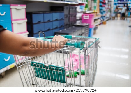 Close up woman shopping in department store