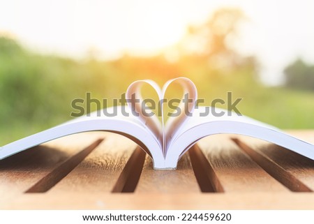 Close up book on table in the morning time