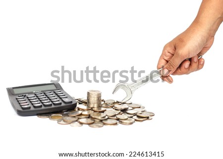 Stack of coin with hand holding wrench in concept repair money problem isolated on white background