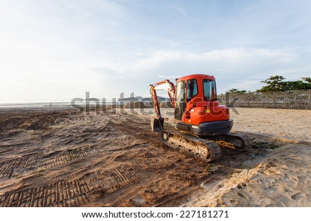Excavator stand in construction site