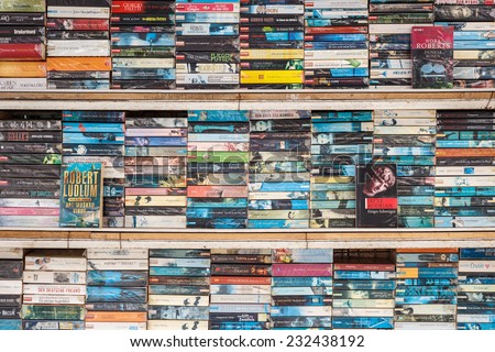 PATONG THAILAND - NOVEMBER 19 : Old books on the shelf for sale at the shop in Patong beach, Patong is a top beach resort town in Phuket, Thailand on November 19, 2014