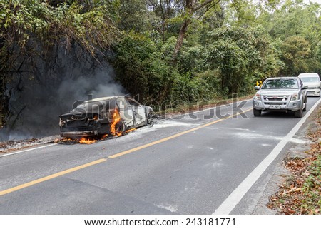 CHIANG MAI, THAILAND - JANUARY 1 : Car fire due to a gas explosion. While driving up to the hill. This makes all the damaged on car but driver is safe on January 1, 2015 in Chiang Mai, Thailand.
