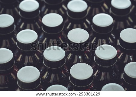 Close up Black plastic bottle and black cap
