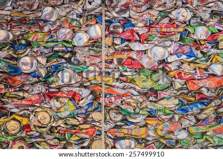 PHUKET, THAILAND - MARCH 3 : Crushed soda and beer cans at a recycling facility in Phuket on March 3, 2015. The cans will be shipped to an aluminum foundry.