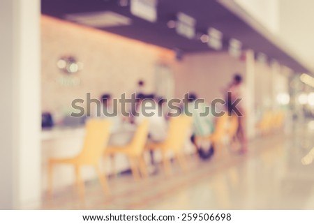 Blurred background : Customer sitting in car service station, vintage color