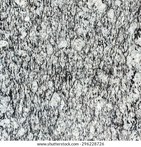 Pattern of black granite stone texture for background