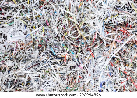 Close up stack of scrap paper from paper cutter for background