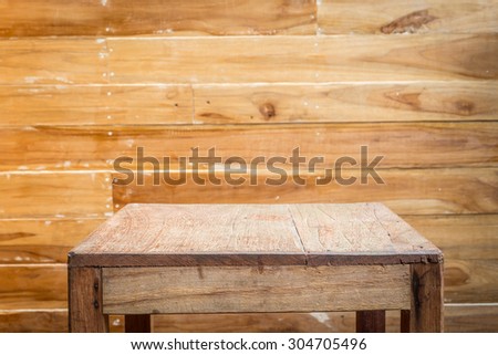 Empty top wooden table and wooden wall background. For product display