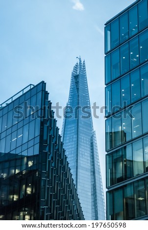 London, United Kingdom - October 2, 2013: The glass Shard building at london bridge, just over 2 years old is the tallest building in europe at over 1,000 feet (310 metres).