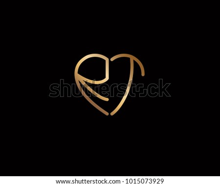 RT initial heart shape gold colored logo Stok fotoğraf © 
