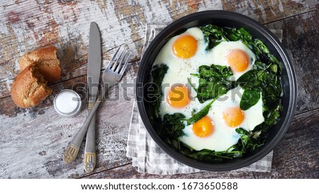 Similar – Image, Stock Photo Fried eggs with green asparagus. Fast lunch ideas, healthy breakfast, summer food.