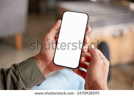 Similar – Image, Stock Photo man using mobile smart phone and computer laptop searching internet, sending sms, using text messenger or online banking.