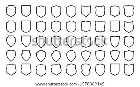 Vector Shield icon. Heraldic shields, security black labels. Knight award, medieval royal vintage badges isolated vector. Protect shape arms silhouette elements set.