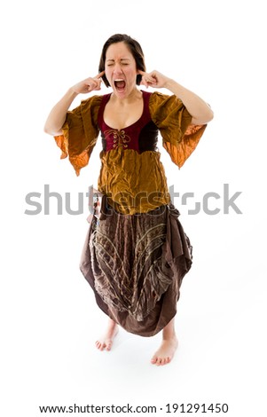 Young woman shouting with fingers in her ears