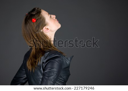 model isolated on plain background back looking behind