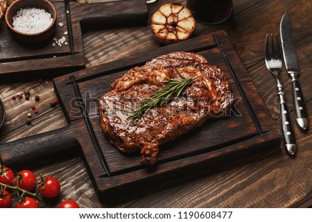 Similar – Foto Bild Kalbfleisch-Rib-Eye mit Gemüse und Soßensoße.