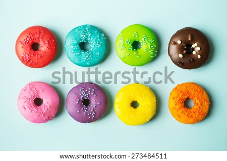 Colorful donuts on a blue background