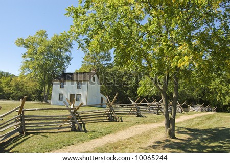 civil war era farm house and split rail fence