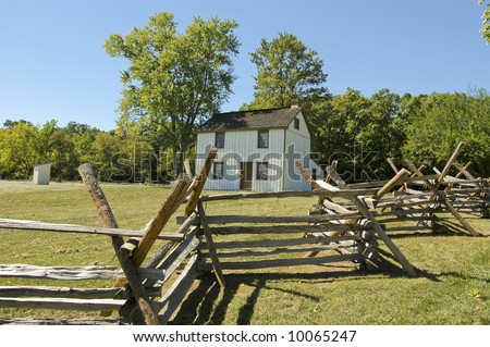 civil war era farm house and split rail fence