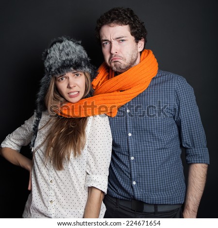 Two young people tied looking unhappy
