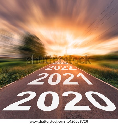 Empty asphalt road and New year 2020 concept. Driving on an empty road to Goals 2020. 商業照片 © 
