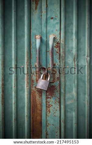 grunge green door lock with key