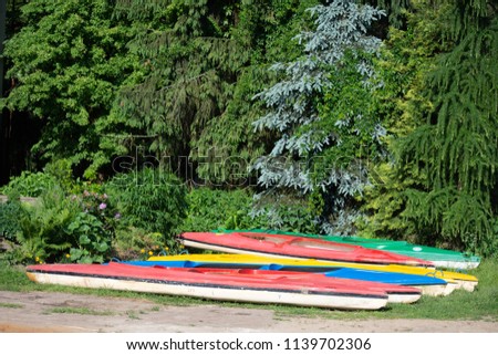 Similar – Image, Stock Photo Many canoes ready to go out