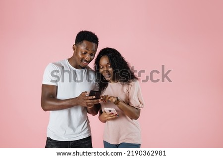 Similar – Image, Stock Photo A cool couple chatting in a beach in the sunset time