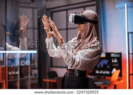 Image, Stock Photo Arab woman in VR headset on embankment