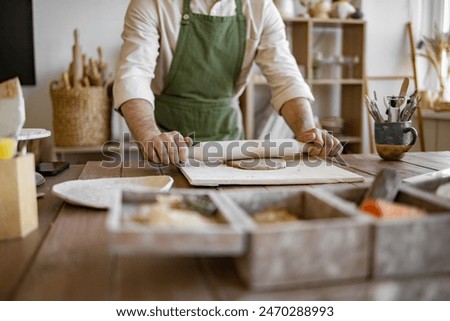 Similar – Image, Stock Photo Crop male ceramist creating cup