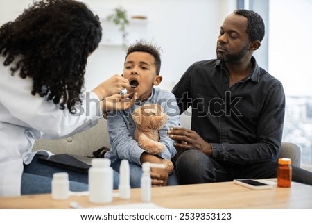 Similar – Foto Bild Junge hält sein Stofftier im Park