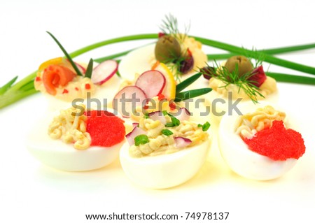 different types of stuffed eggs for polish breakfast isolated on white background
