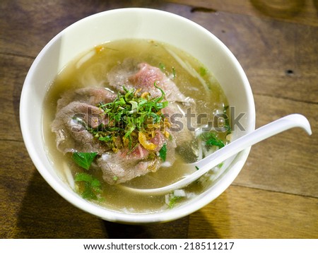 Pho bo , Vietnamese food , rice noodle soup with sliced rare beef