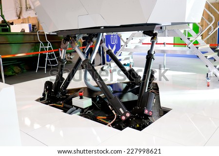 PARIS, FRANCE - OCTOBER 30, 2014: A flight simulator is on display at Euronaval, a major Defense and Marine Military exhibition in Le Bourget near Paris, France.