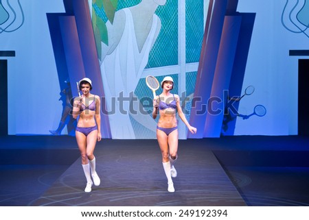 PARIS, FRANCE - JAN. 25, 2015: Models walk the runway at the International Lingerie Show in Paris where over 20,000 buyers meet 500 exhibitors from 37 different countries.