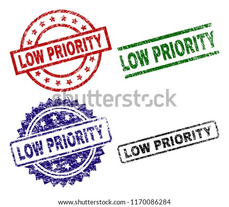 LOW PRIORITY seal prints with distress texture. Black, green,red,blue vector rubber prints of LOW PRIORITY label with scratched texture. Rubber seals with round, rectangle, rosette shapes.
