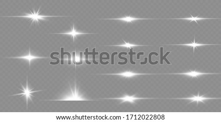 Set of flashes, Lights and Sparkles on a transparent background. Bright gold flashes and glares. Abstract golden lights isolated Bright rays of light. Glowing lines.
