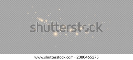 Golden sequins glow with many lights. Glittering dust. Luxurious background of golden particles.