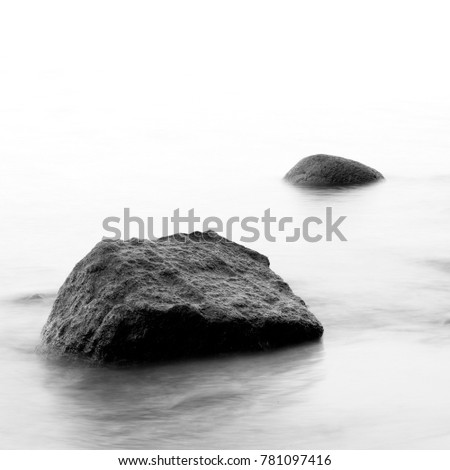 Monochrome black & white shore sea water and stones on the Orlowo beach in Gdynia, Tricity, Poland Photo stock © 