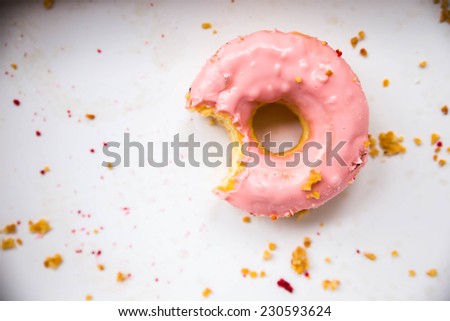 Pink Donut with Bite Missing Isolated