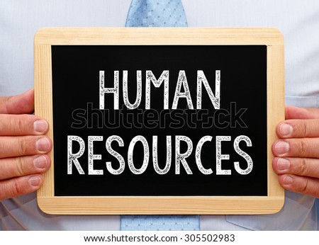 Human Resources - Businessman with chalkboard and text