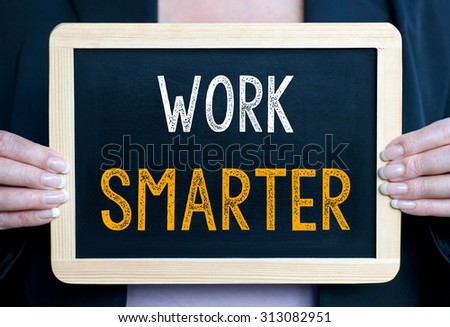 Work smarter - Woman holding chalkboard with text